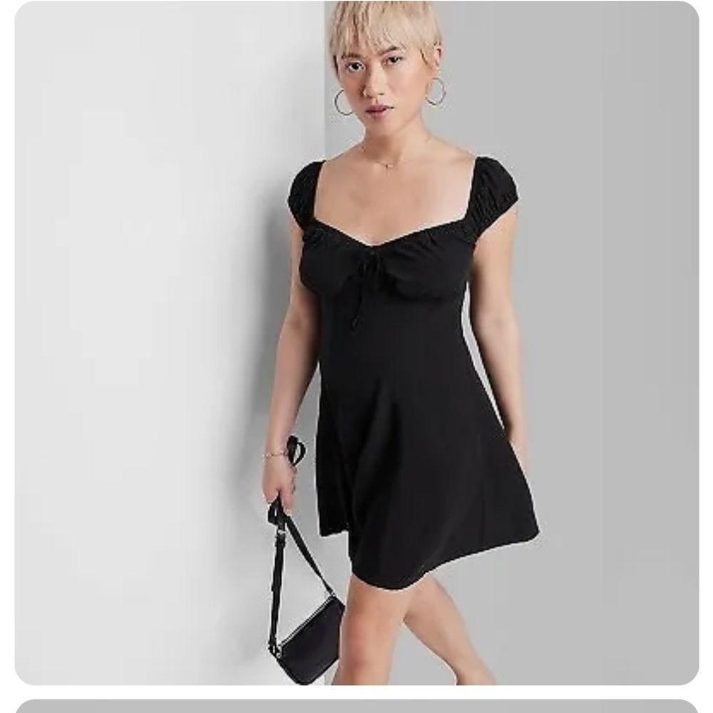 Women's Cap Short Sleeve Fit & Flare
Mini Skater Dress - Wild Fable Black
New - Picture 3 of 4